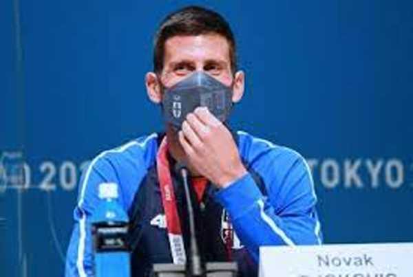 कोरोना संक्रमित होने के कारण जोकोविज ने मांगी थी चिकित्सा छूट : वकील कोरोना संक्रमित होने के कारण जोकोविज ने मांगी थी चिकित्सा छूट : वकील